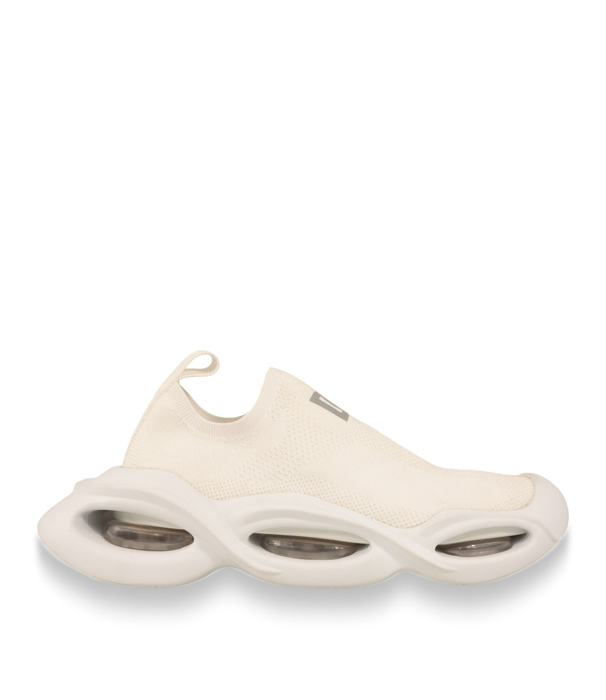 Dolce & Gabbana Slip-On Sneaker in Creme, Seitenansicht mit wellenförmiger Luftkammersohle