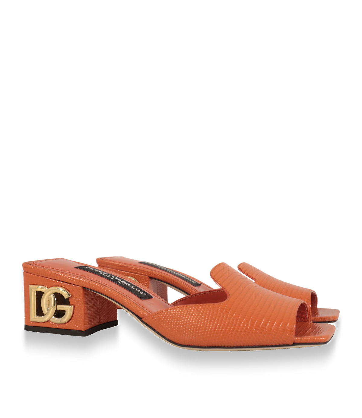 Dolce & Gabbana Mules aus Leder mit Iguana-Prägung, Paar in Dreiviertelansicht