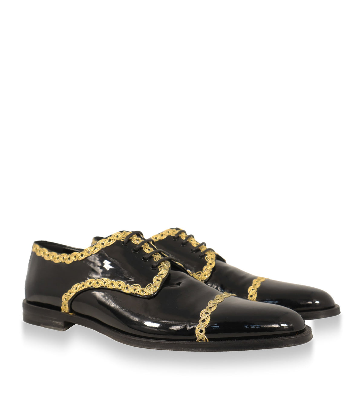 Dolce & Gabbana Derby Schuhe Paar in schräger Ansicht mit goldenen Posamentenborten