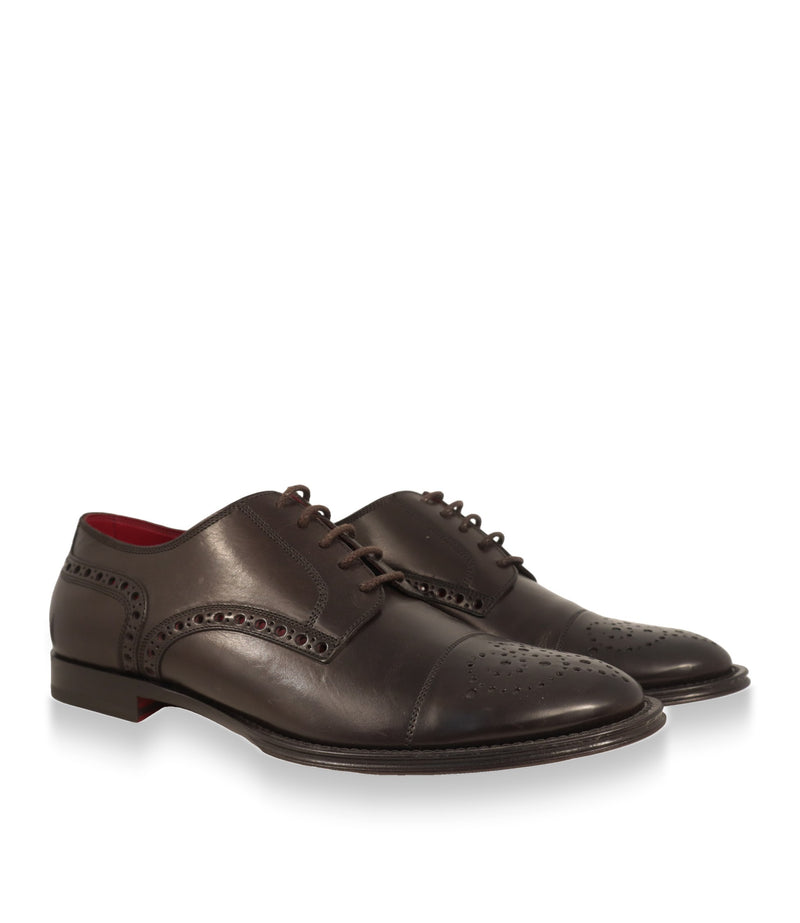 Dolce & Gabbana Derby Schuhe Paar in Schrägansicht mit rotem Lederfutter