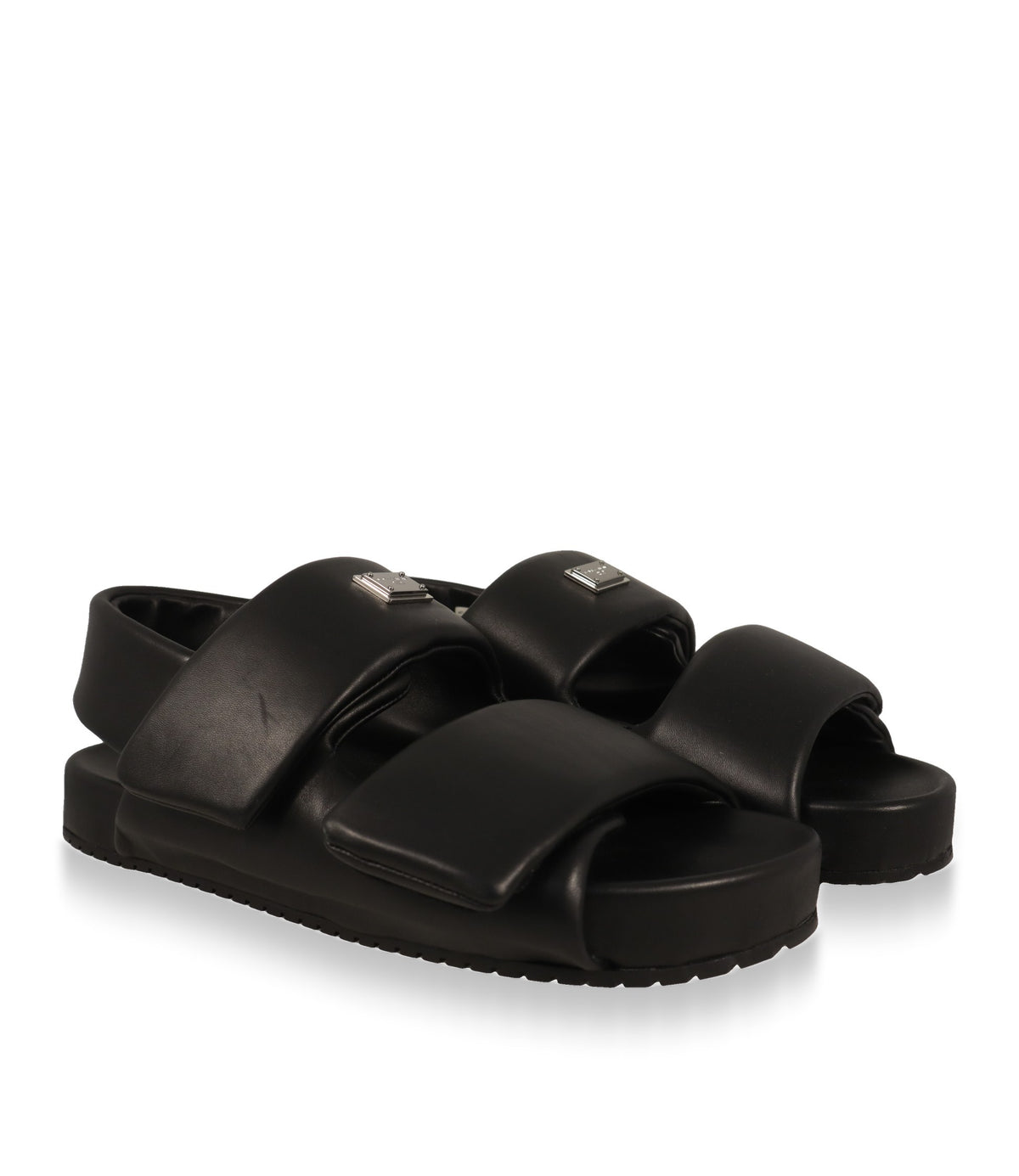 Schwarze Dolce & Gabbana Sandalen aus Leder, Schrägansicht mit silberner Logoplakette