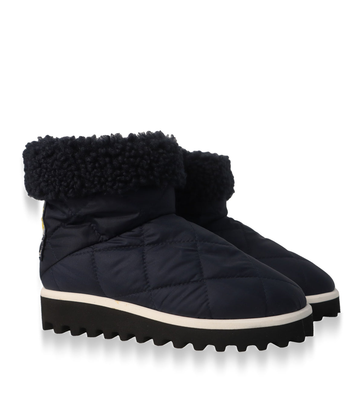 Dolce & Gabbana Kinder Boots aus gestepptem Nylon, Paar in Schrägansicht mit weißer Zwischensohle