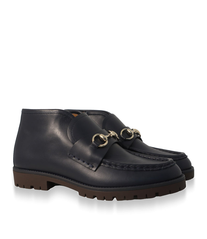 Gucci Stiefeletten Kinder in Marineblau im Paar, Dreiviertelansicht mit brauner Profilsohle
