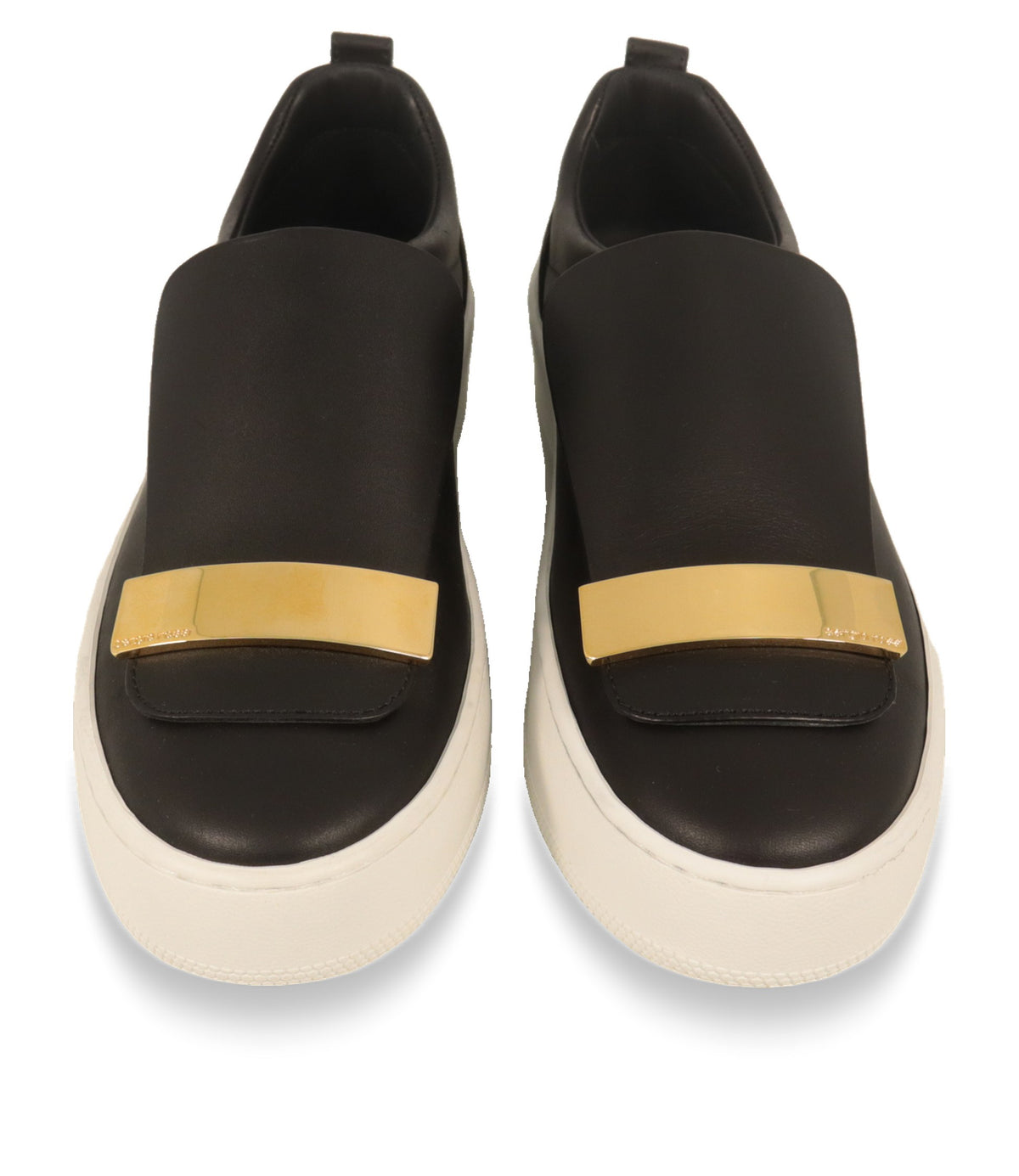 Sergio Rossi Slip-On Sneaker in Schwarz von oben mit runder Zehenform und Goldbeschlag