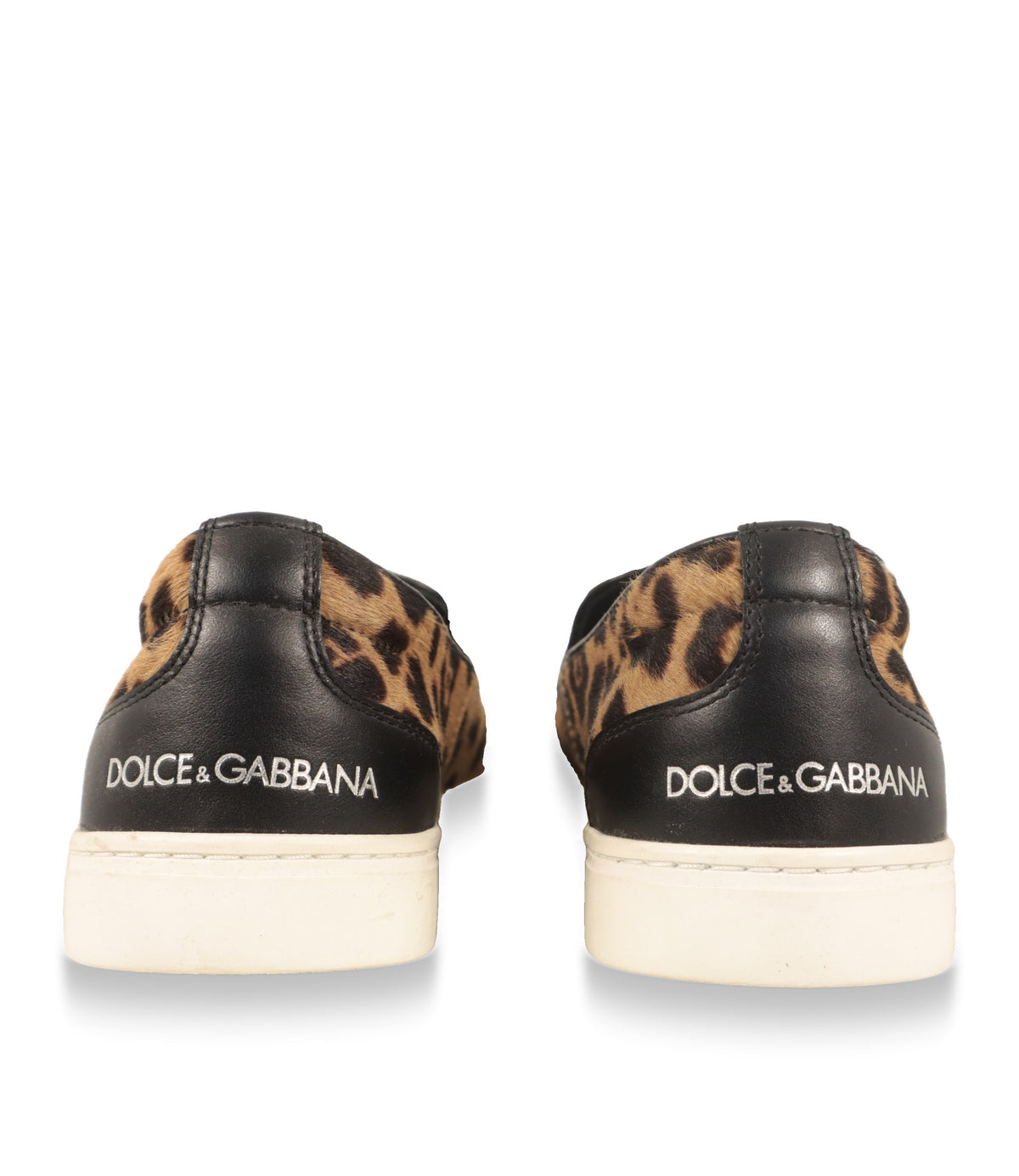Dolce & Gabbana Slip-On Sneaker Fersenansicht mit silbernem Logo auf schwarzem Leder