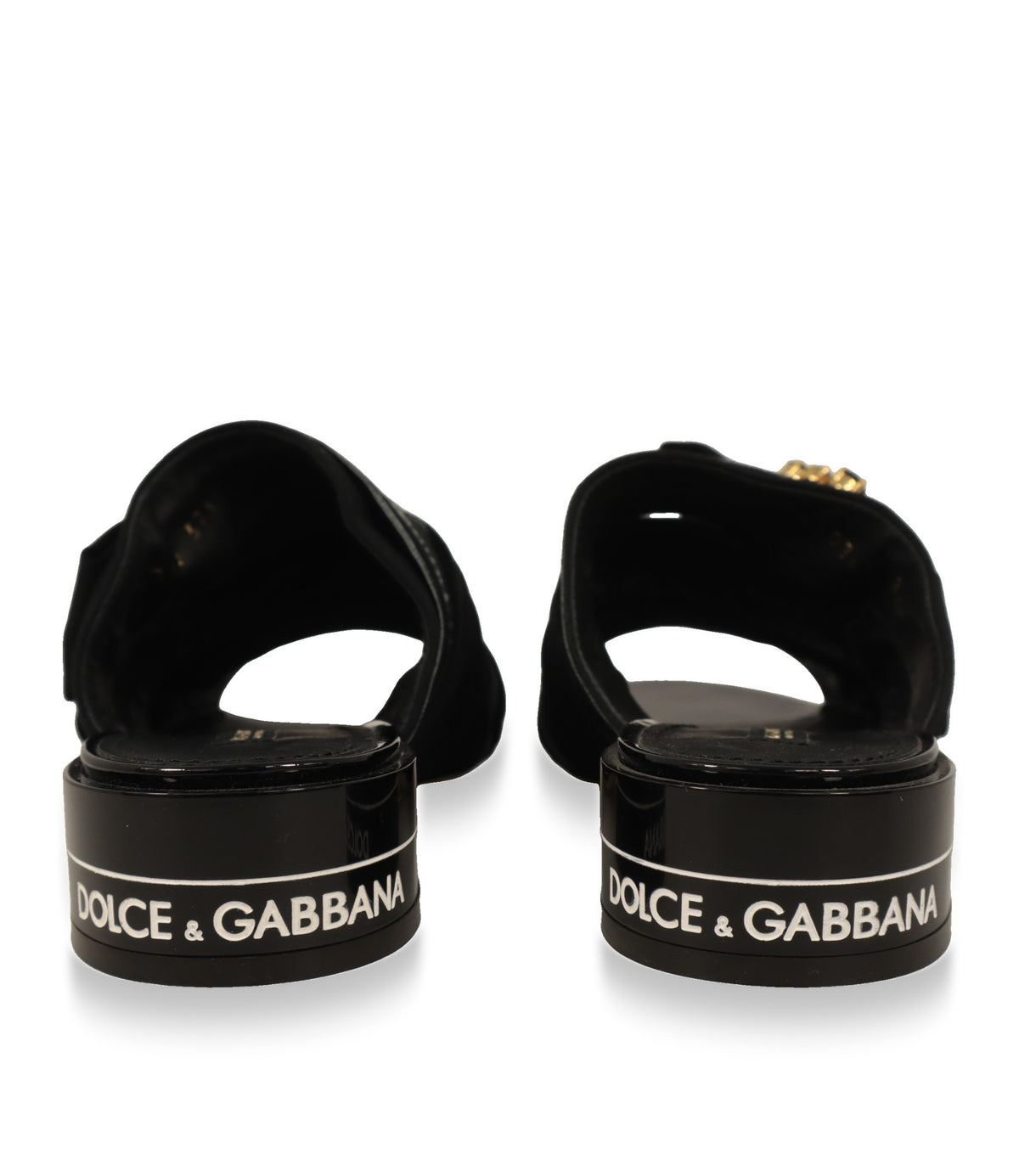 Rückansicht der Dolce & Gabbana Mules mit Logo-Schriftzug am Absatz