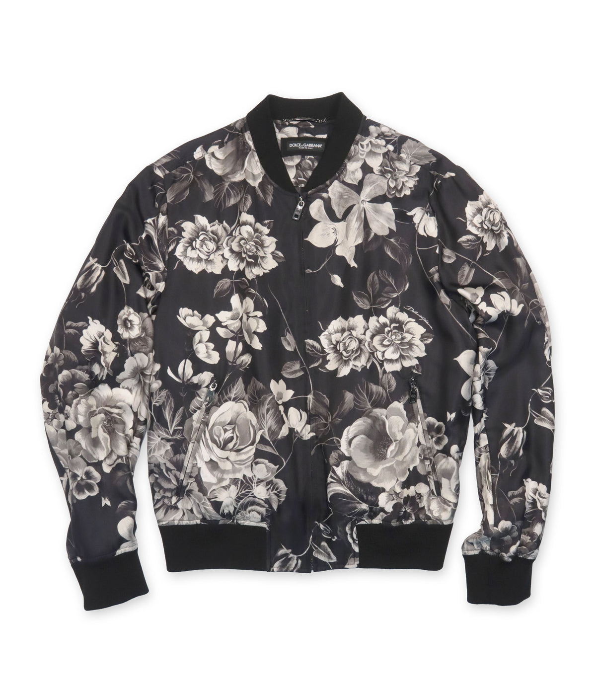 Dolce & Gabbana Bomberjacke aus Seide mit floralem Schwarz-Weiß-Print Größe 52