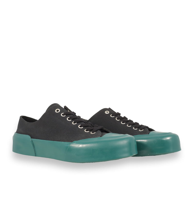 Jil Sander Sneaker Größe 39 aus schwarzem Canvas mit grün-türkiser Gummisohle und modernem Designer-Look.