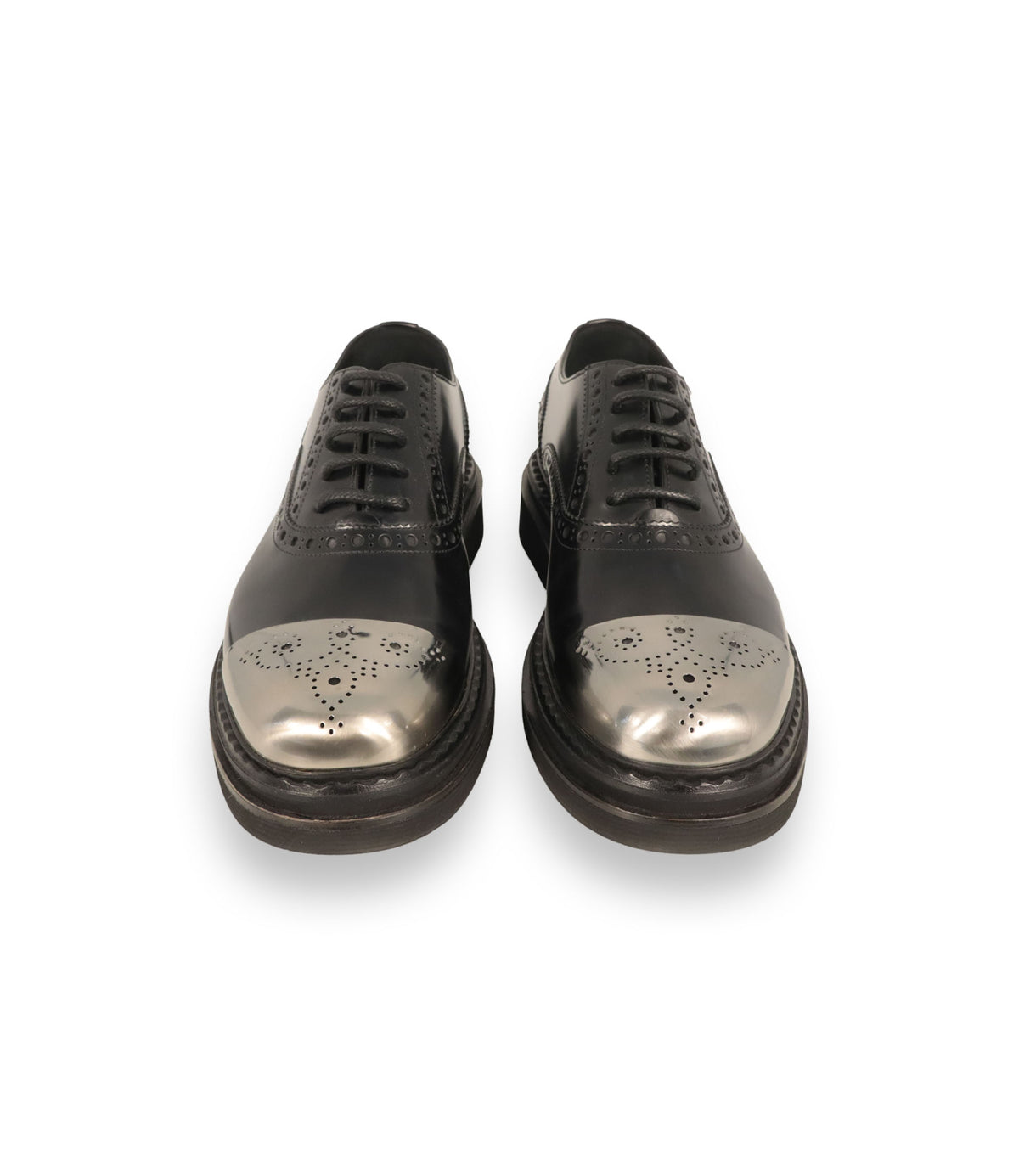 Dolce & Gabbana Schnürschuhe Größe 41,5 aus schwarzem Leder mit silberner Metallkappe und Brogue-Details.
