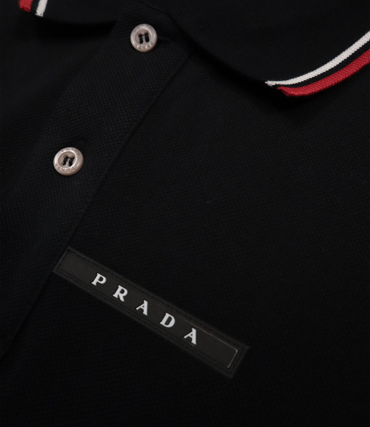 Prada Poloshirt schwarz Größe L mit Logo und Kontrastdetails