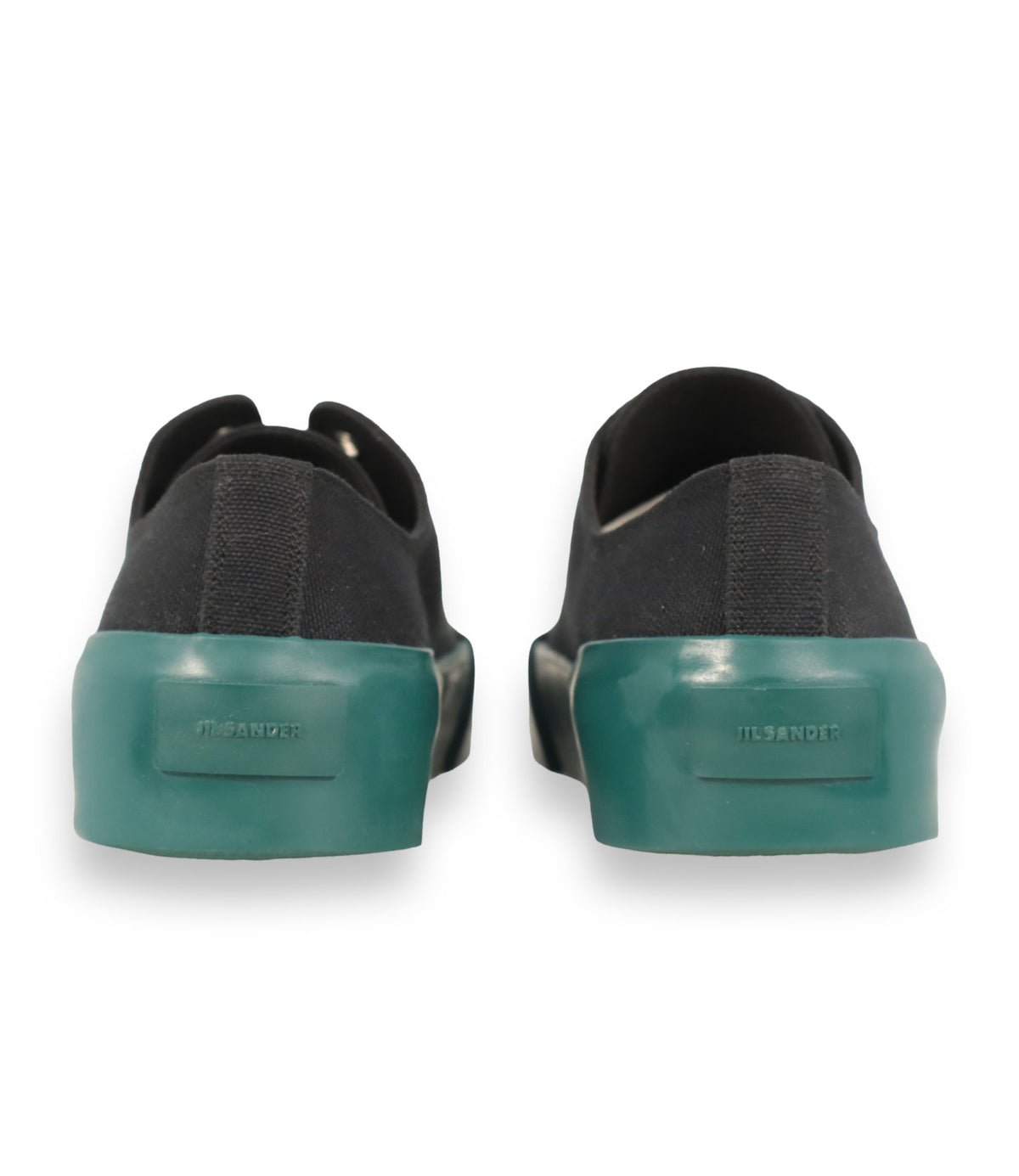 Jil Sander Sneaker Größe 39 aus schwarzem Canvas mit grün-türkiser Gummisohle und modernem Designer-Look.