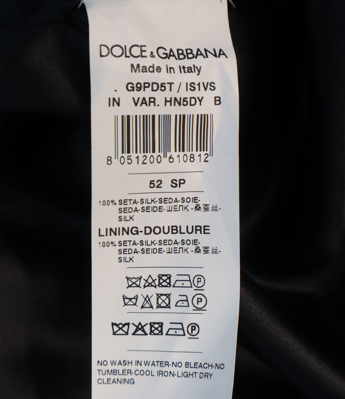 Dolce & Gabbana Bomberjacke aus Seide mit floralem Schwarz-Weiß-Print Größe 52