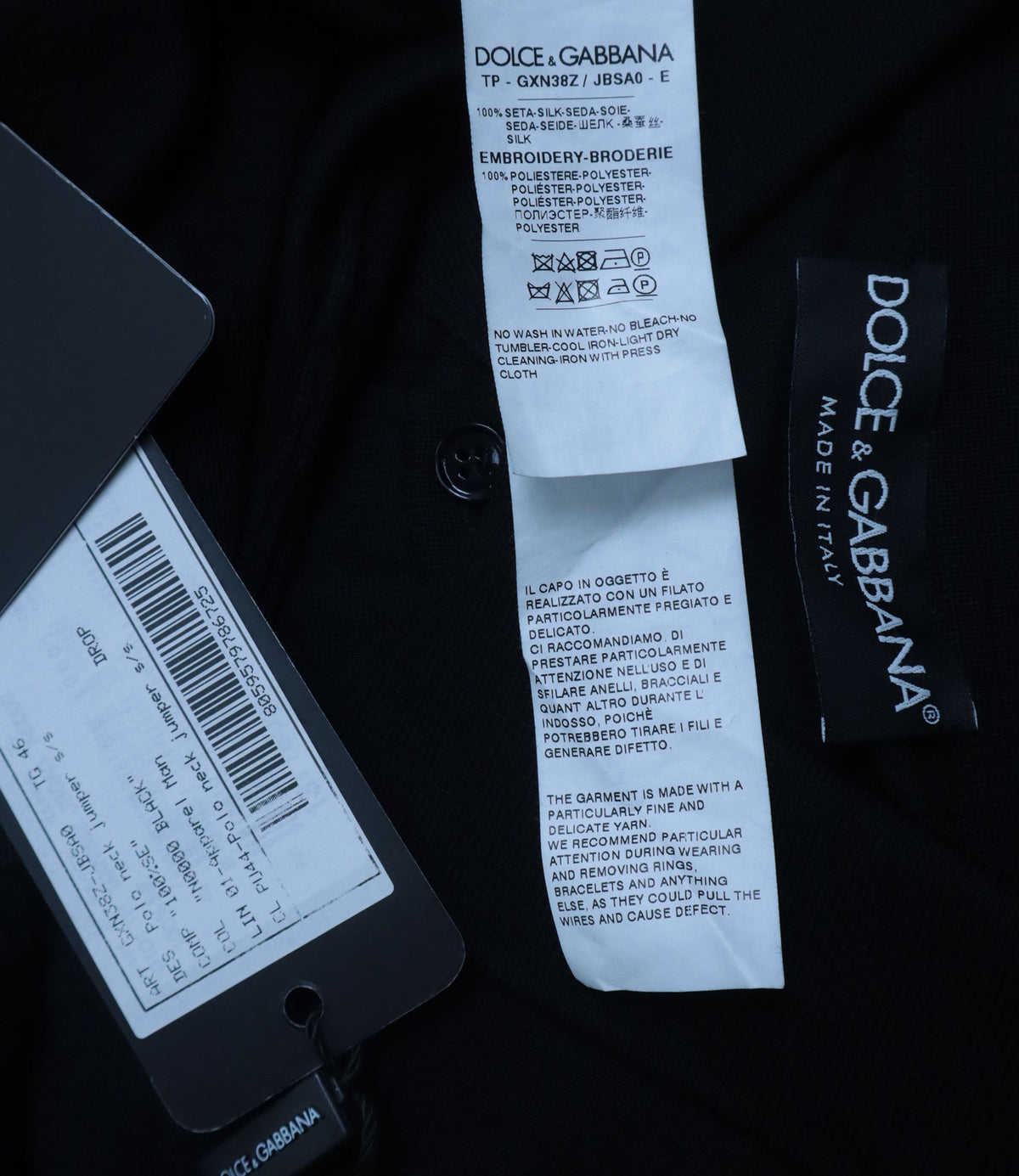 Dolce & Gabbana Polo-Shirt aus schwarzer Seide mit DG Logo Stickerei
