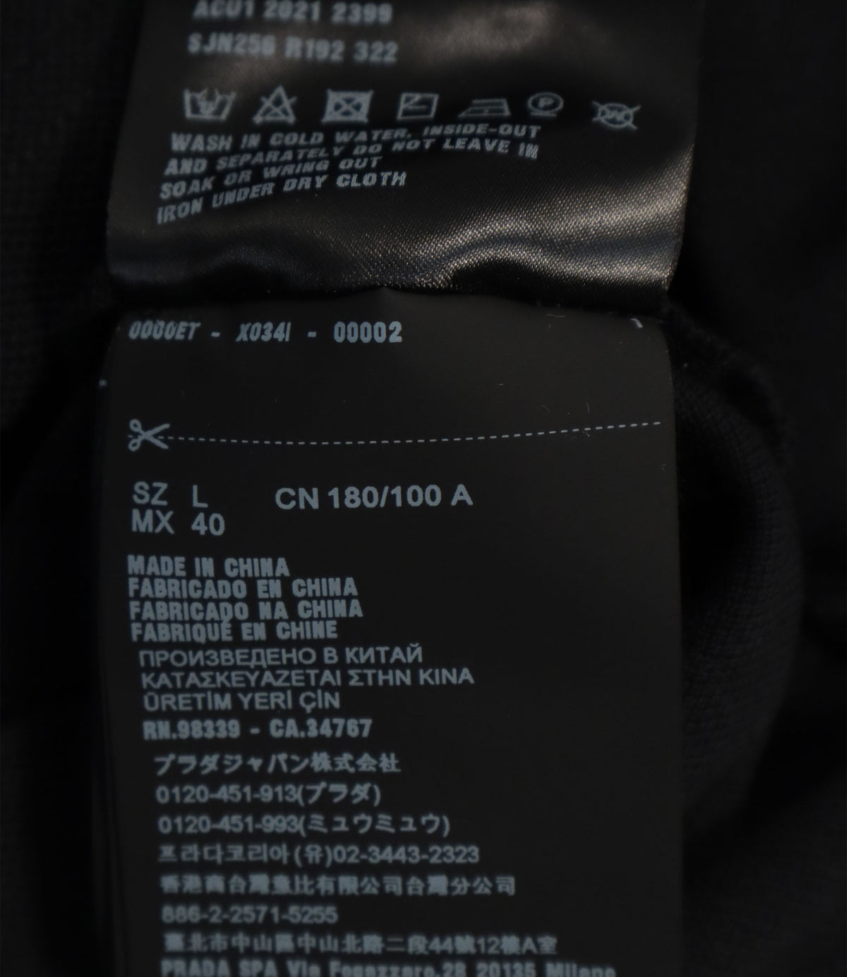 Prada Poloshirt schwarz Größe L mit Logo und Kontrastdetails