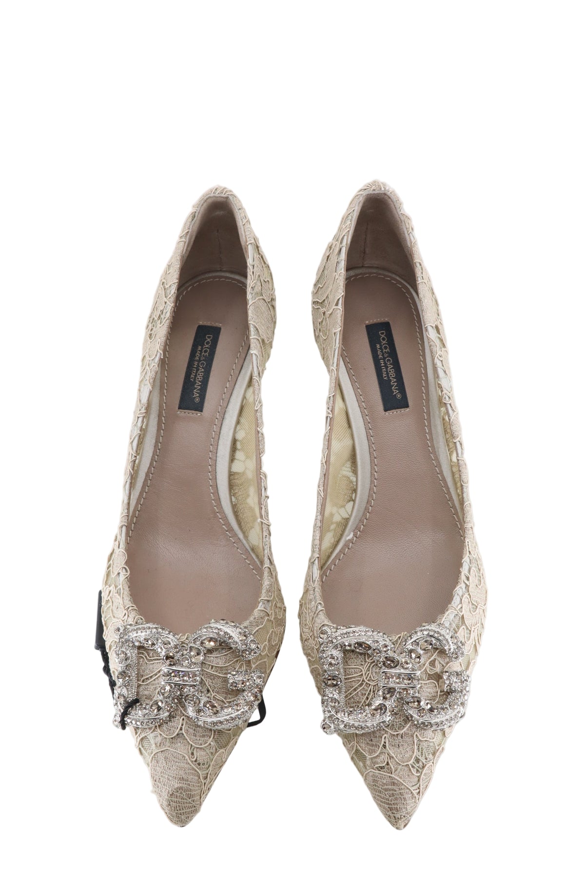 Dolce & Gabbana Pumps aus beigefarbener Spitze mit Schmuckapplikation